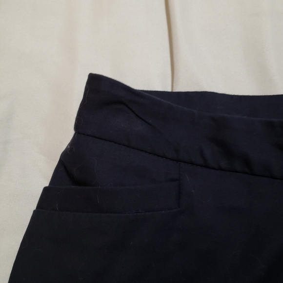 Rozali 18 Women navy blue capris with button detail on legs,pockets,zipper front - Picture 4 of 5